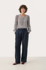 Nanati High-Waisted, Wide-Legged Pleated Linen Pants in After Midnight Dark Blue