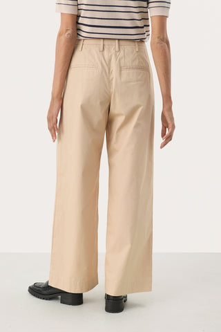 Nanati High-Waisted, Wide-Legged Pleated Cotton Pants in Sesame